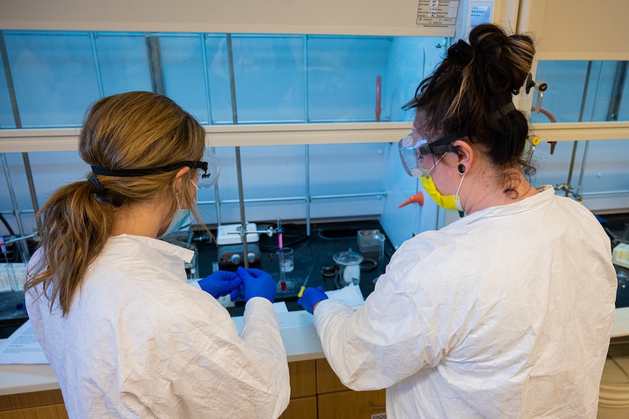 Two students at a chemistry lab